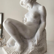 1970'S MARBLE SCULPTURE OF NUDE WOMAN IN THOUGHT